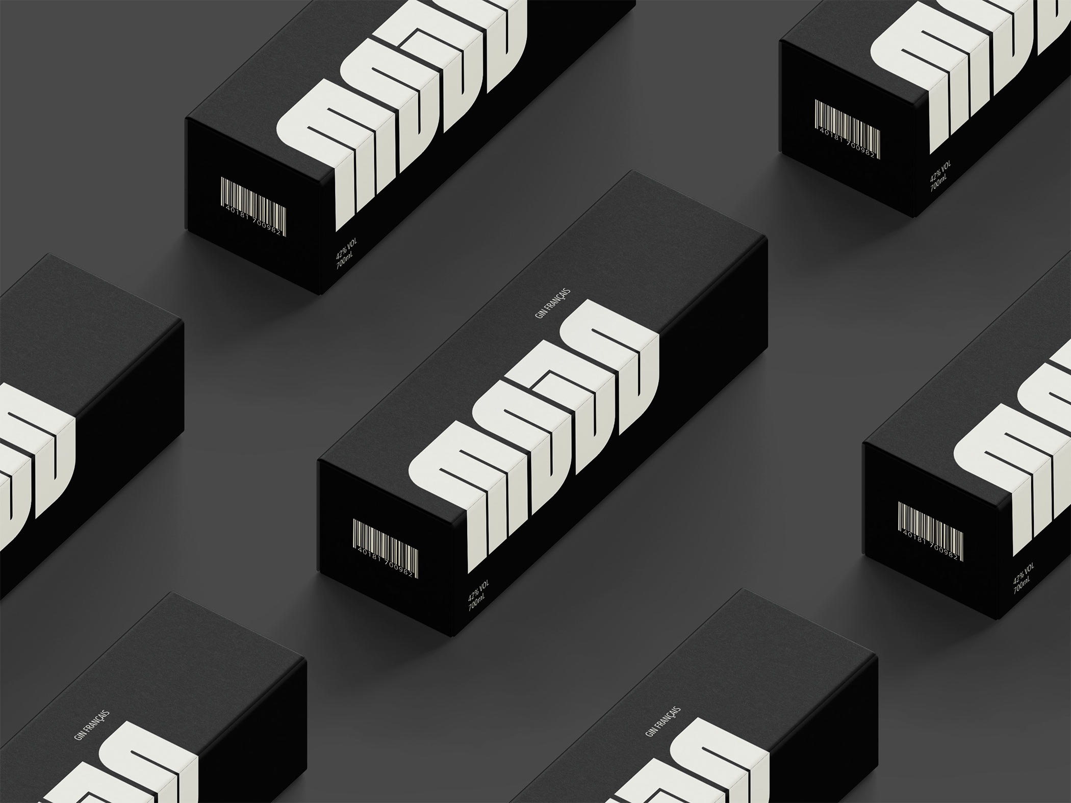 Plusieurs emballages du gin Mojo disposés en perspective, montrant le design du packaging.