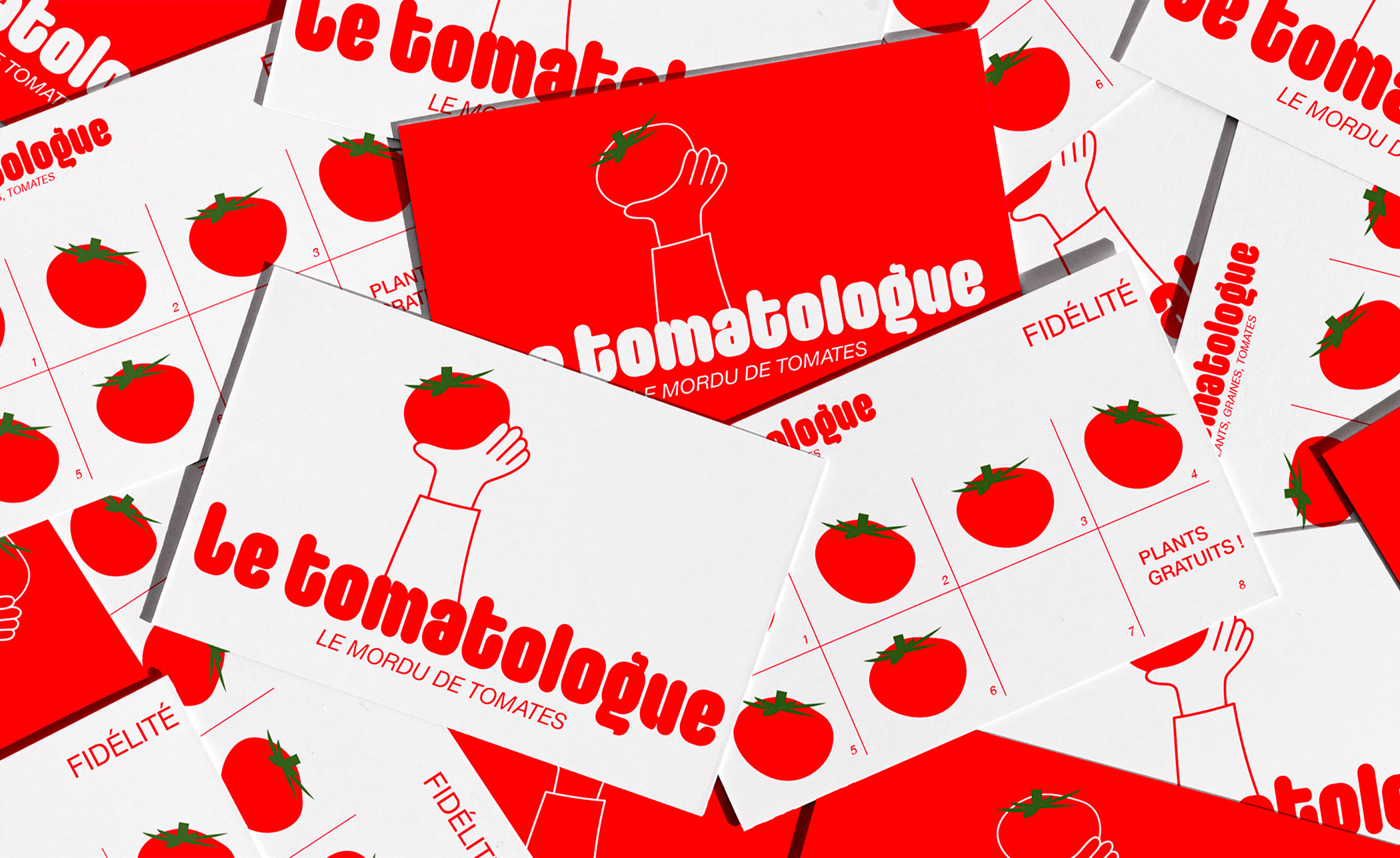 Carte de visite et de fidélité "Le Tomatologue" avec des tomates et une main tendue vers le haut portant une tomate.